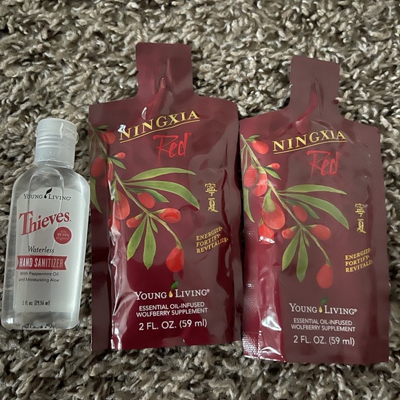 Young Living Thieves hand sanitizer and 2 ningxia